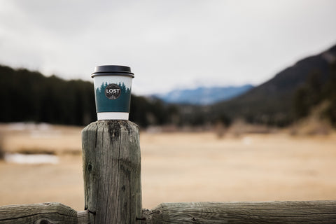 Lost coffee cup with mountains in the background