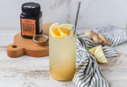 lemonade-in-glass-cup-with-lemon-slices-and-honey