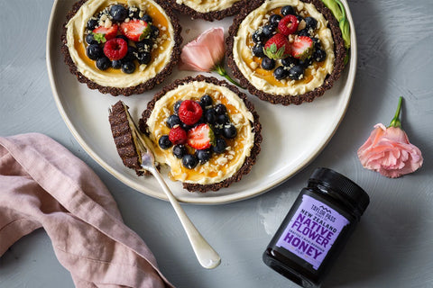 taylor pass honey vanilla tarts with chocolate base and berry toppings