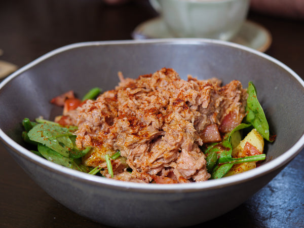 tuna salad in bowl with vegetables