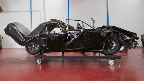 The destroyed Dodge 3700 GT in which Luis Carrero Blanco was assassinated, on display.