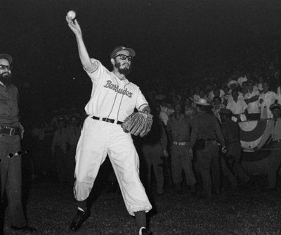 Fidel Castro pitching a baseball