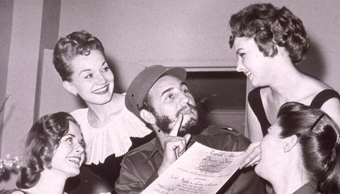 Fidel Castro, heart throb, surrounded by adoring women