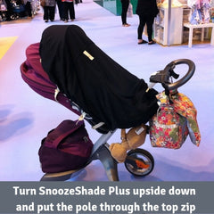 SnoozeShade Plus on a parent-facing Stokke Xplory