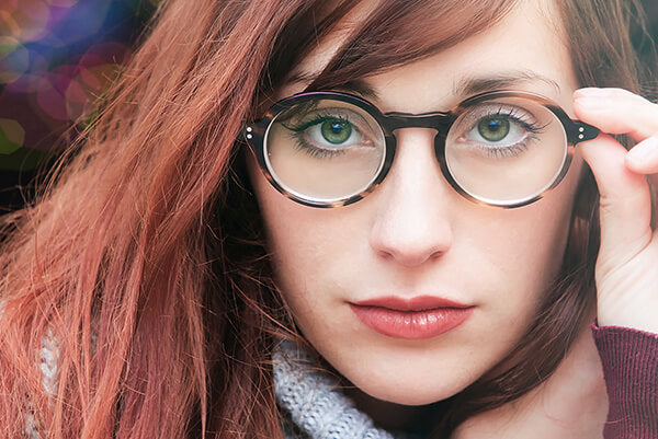 a woman wearing glasses