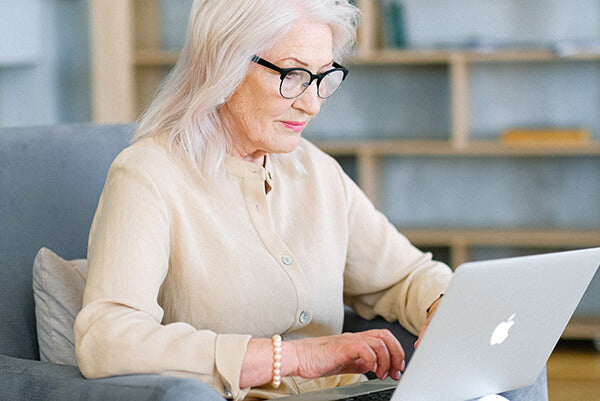 woman looking at computer