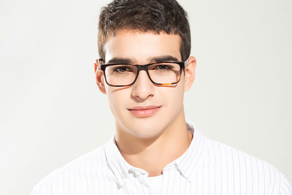 A man wearing Wayfarer glasses