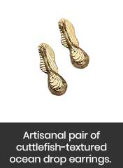 Cuttlebone-inspired texture featuring unique earrings, handmade in Jaipur
