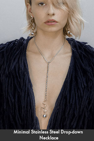 Model wearing stainless steel long drop down necklace 