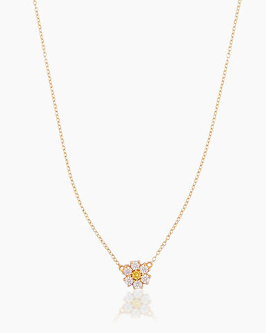 gold necklace with flower pendant