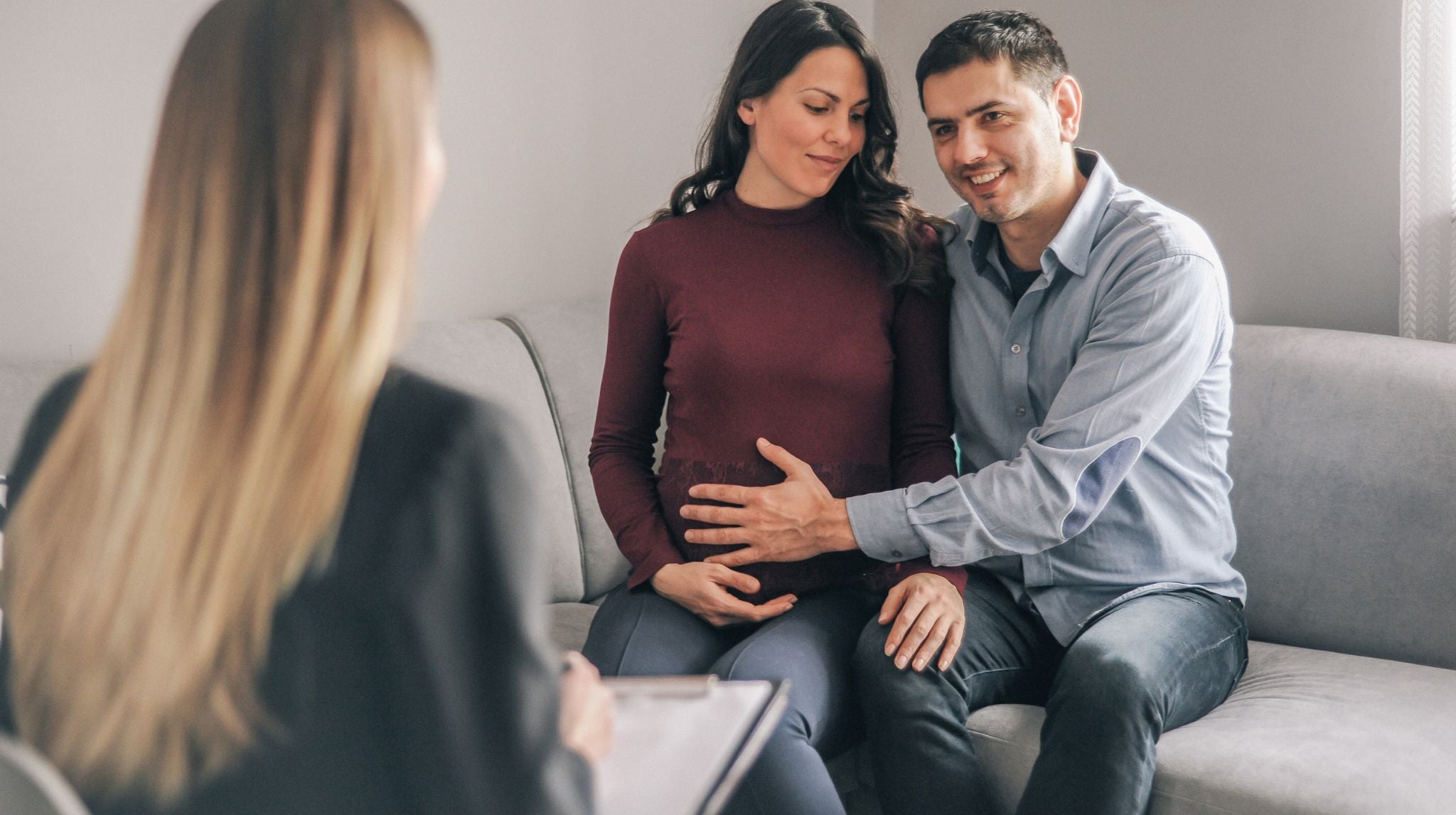 Genetic consultant advising couple during pregnancy | Neeva Baby