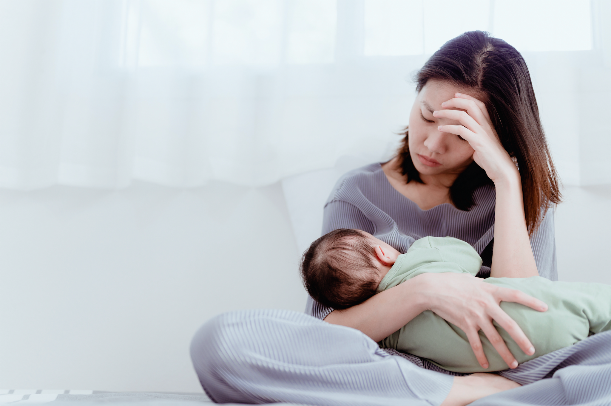 Woman Suffering From Postpartum Depression