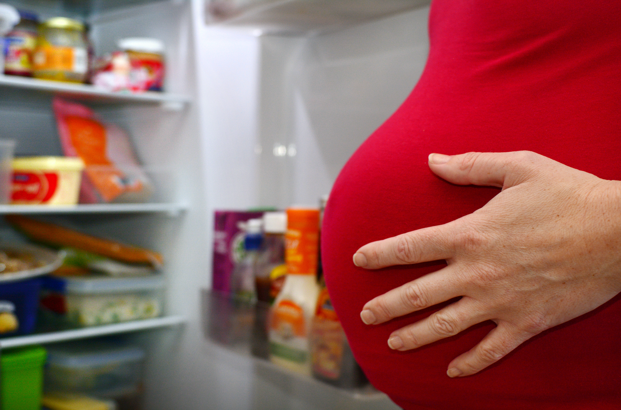 Pregnant Woman At Refrigerator | Neeva Baby