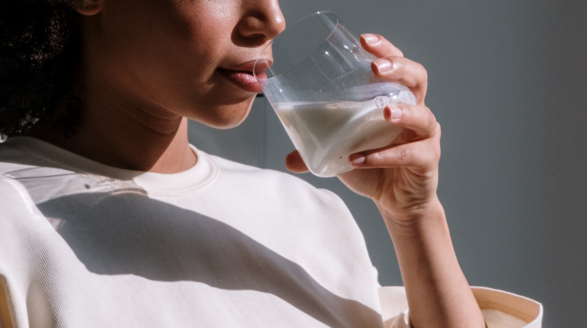 Pregnant woman drinking water | Neeva Baby