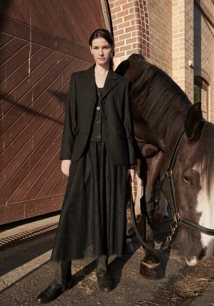 The Dressage Boyfriend Jacket in Black (available late April) over the Willow v-neck Cardigan in Charcoal with the Tulle Skirt in Black.