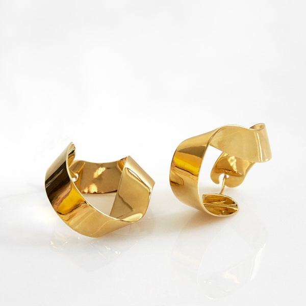 Gravity Earrings in gold by PD Paola