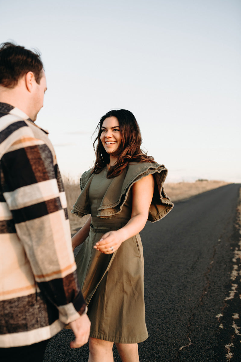 Cristina wears the Fringe Dress in Khaki.