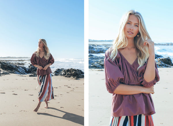 Lily wears the Hue Wrap Top and the Shutter Draped Skirt.