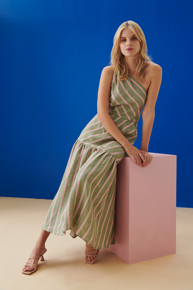 Jessica wears the Carnival One Shoulder Dress in Green/Pink.