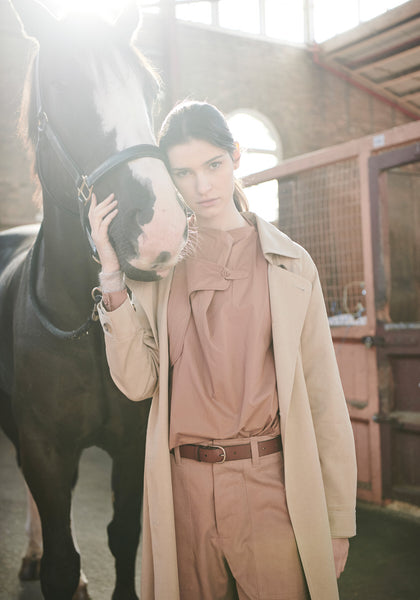 The Canter Trench in Natural over the Ryder Saddle Shirt in Fox and the Canter Pant in Fox.