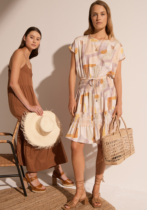 The Clover Sundress in Toffee, and the Spectrum Full Dress.