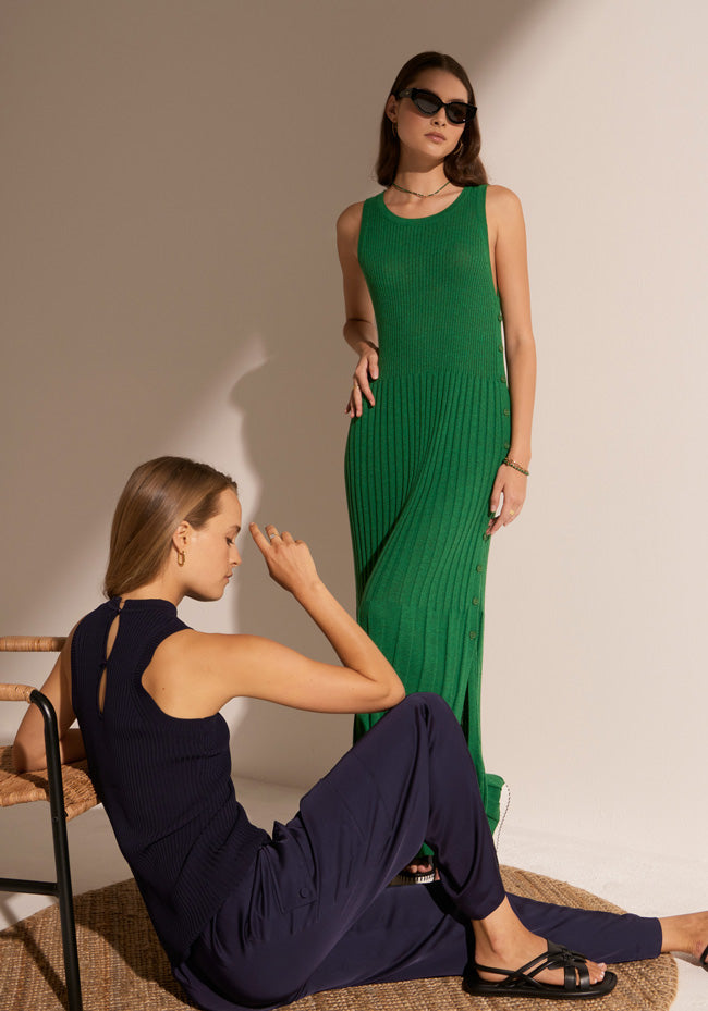 Esti wears the Milla Tank and Clese Cargo in Ink and Megumi wears the Maui Ribbed Dress in Green.