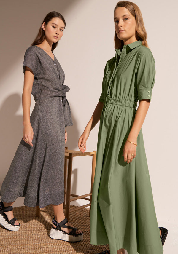 Megumi wears the Isla Wrap Dress and Esti wears the Toya Maxi Dress in Green.