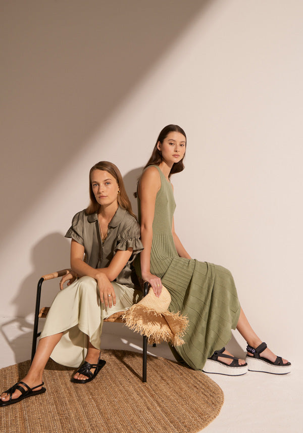 Esti wears the Clese Shirt with the Clese Bias Skirt and the Megumi wears the Maui Ribbed Tank Dress