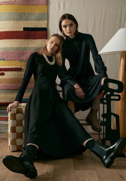 Dinah wears the Atwood Off Shoulder Dress and Beck wears the Nucleus Knit Dress.