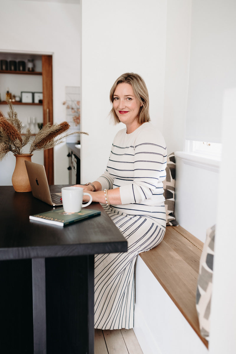 Emma wears the Gizelle Lurex Stripe Knit and Skirt