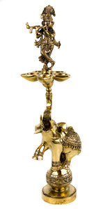 Lord Krishna Lamp on a raised Elephant Trunk