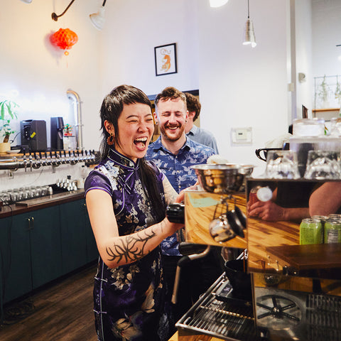 Kat, the owner of Happy Gut Sanctuary, and another barista having an absolute blast.