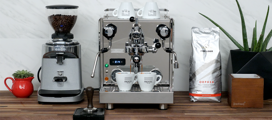 Image of a ceado grinder, profitec machine and a bag of whole bean maromas orphea coffee.