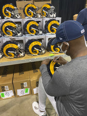 Eric Dickerson signing full size helmets