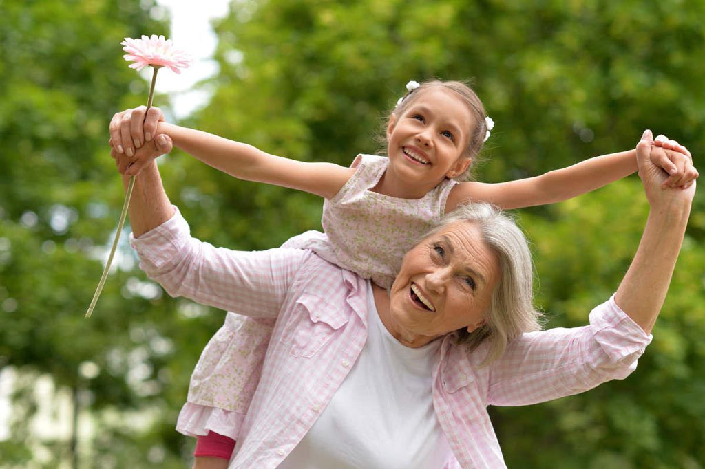 Portrait of granny and granddaughter posing outdoors | Acetyl-L-Carnitine: The Lesser Known Cousin | ACETYL-L-CARNITINE