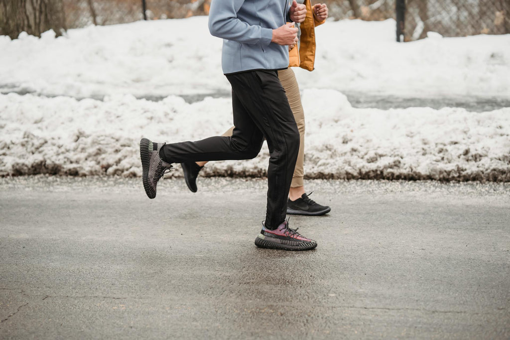 two people running