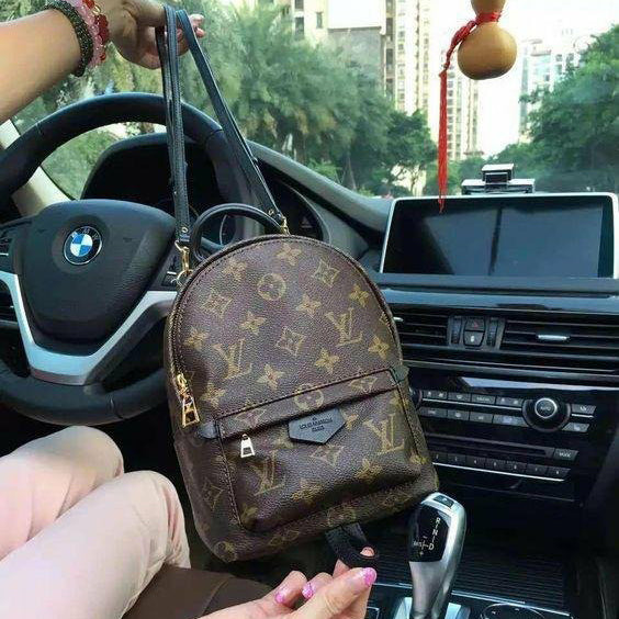 LV Louis Vuitton Women Casual School Bag Cowhide Leather Backpack from