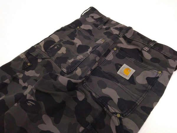 BAPE X CARHARTT 1ST CAMO BLACK PANTS – Undothedone