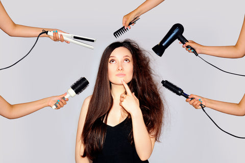 Woman trying to decide on a new look and hairstyle.