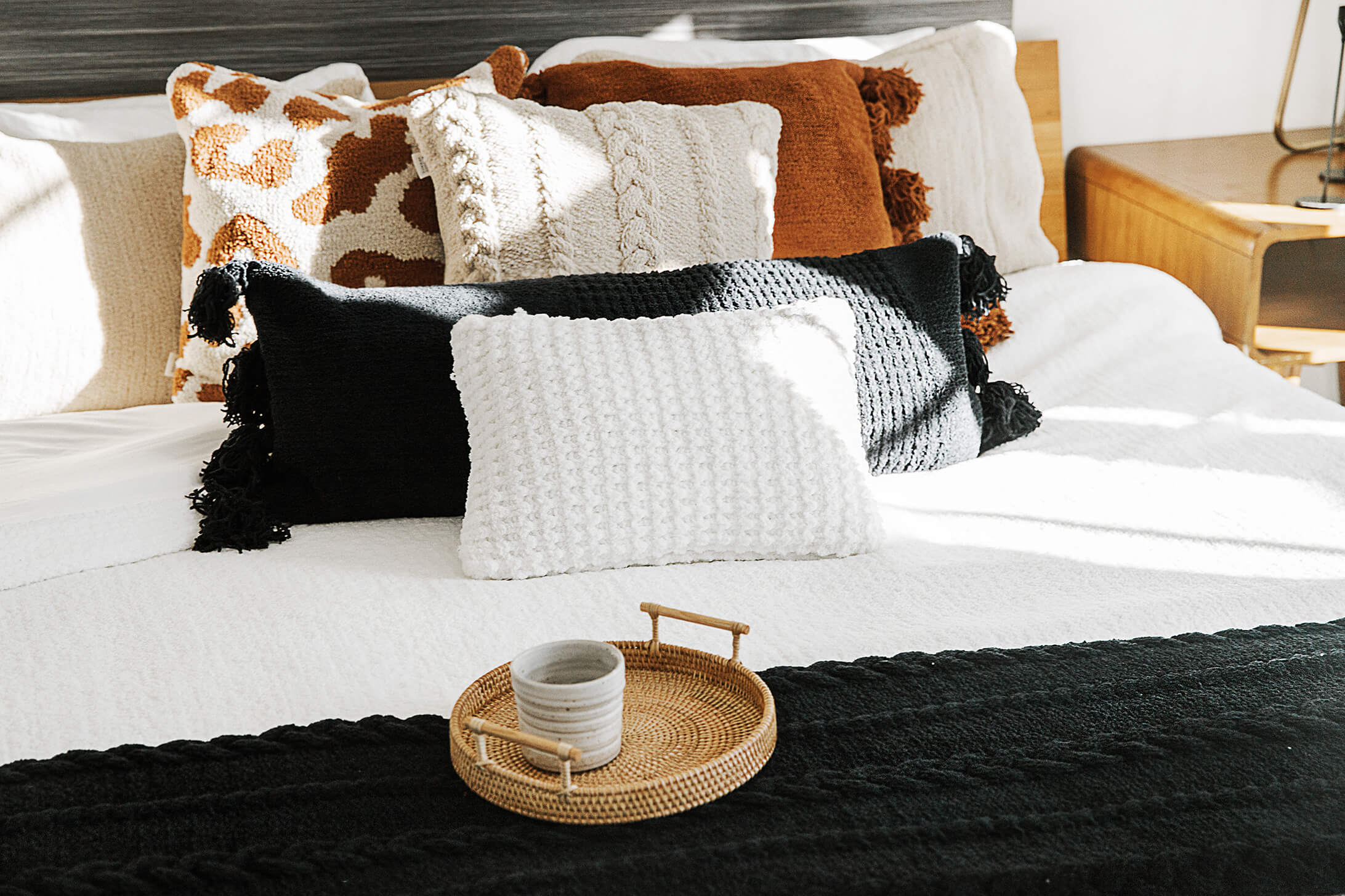 Black, White, and Tan bedding. Mixed neutral color bedroom. Boho bedroom inspo. Boho decor pillows