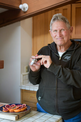 Farmer Al brixing Moro blood oranges