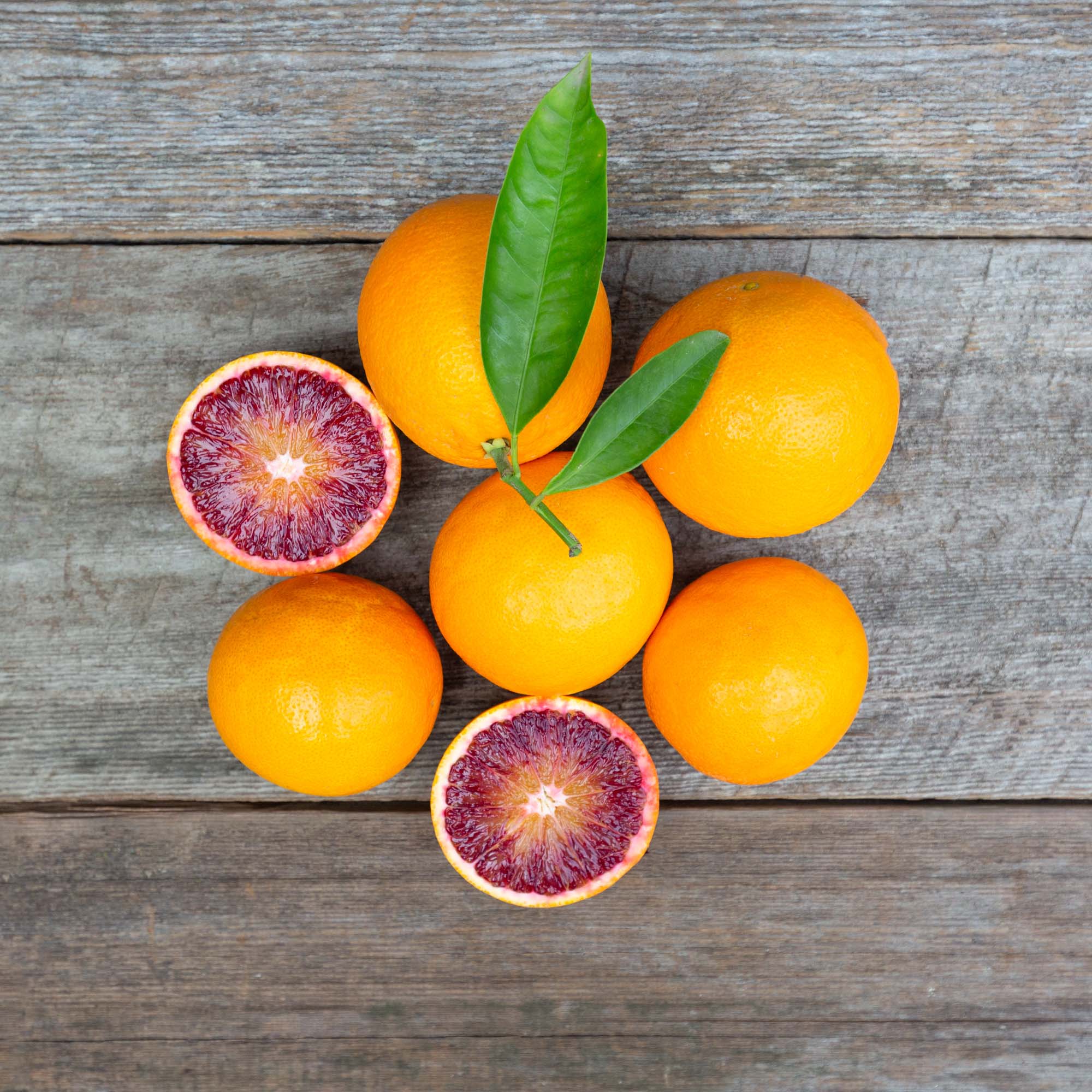 https://cdn.shopify.com/s/files/1/0079/1972/products/sanguinelli-blood-oranges-flat-lay.jpg?v=1642462402