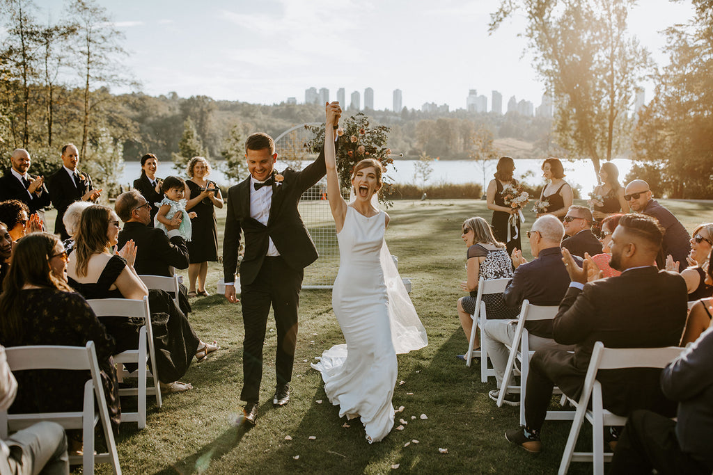 Vancouver couple out door fall wedding walking away