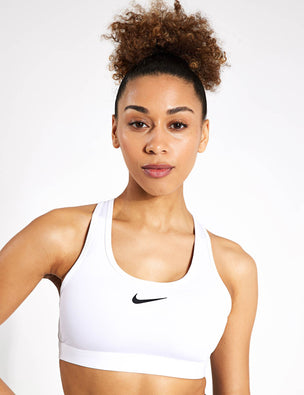 Buy Nike Women's Dri-FIT Swoosh Medium Support Sports Bra White in KSA -SSS