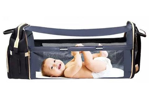 Sac a langer lit nomade pour changer bébé n'importe où