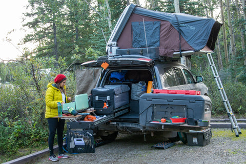 Overlanding rig at campsite with rooftop tent