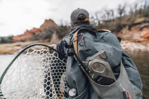 ACLIM8 COMBAR multitool in a fisherman's backpack