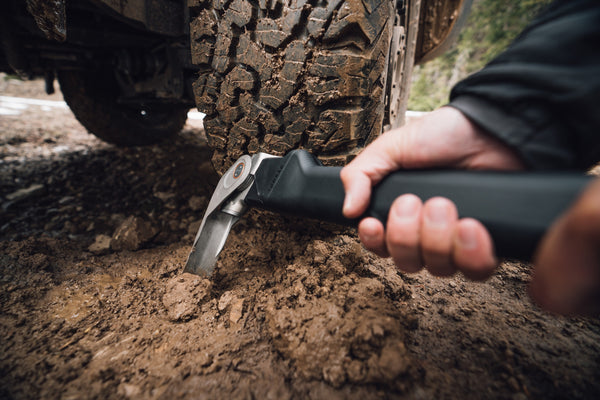 digging out a tire with an ACLIM8 COMBAR 