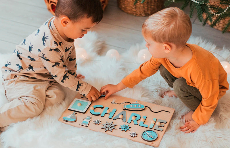grandchildren using the custom name montessori wooden board