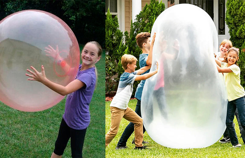 grandchildren playing with the giant jelly balloon ball